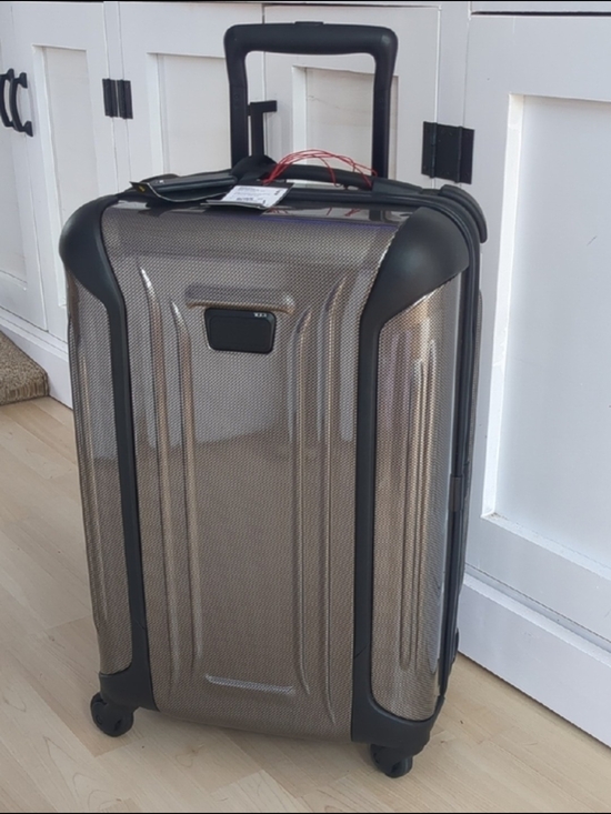 Tumi Handbags - TUMI Hardshell 22" Carry-On Roller in Metallic Tan-Beige.